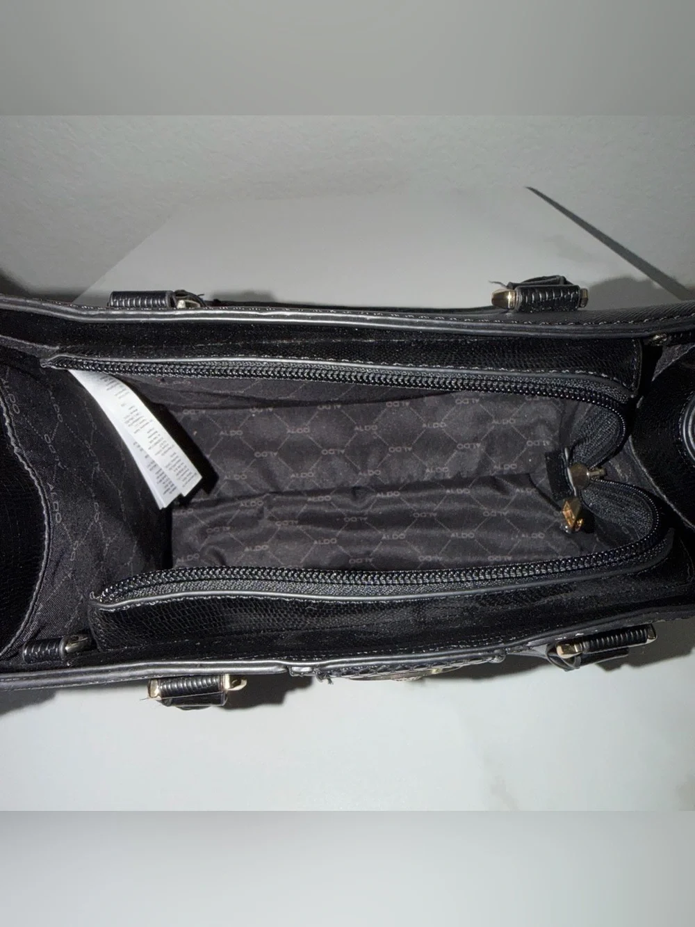 ALDO Black Satchel with Snake-Print Center and Gold Medallion